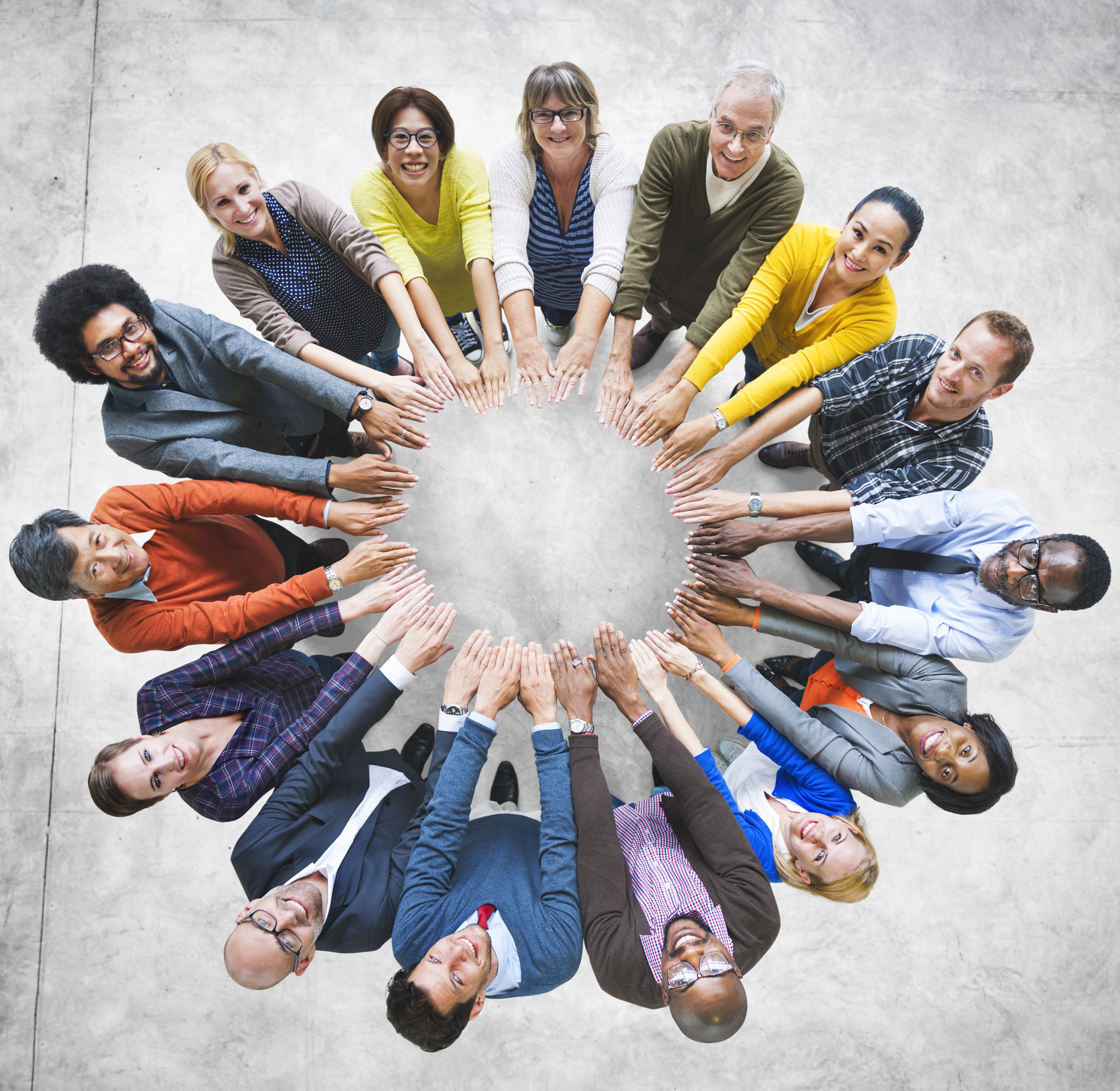 Diverse group of people in a circle Diverse group of people in a circle